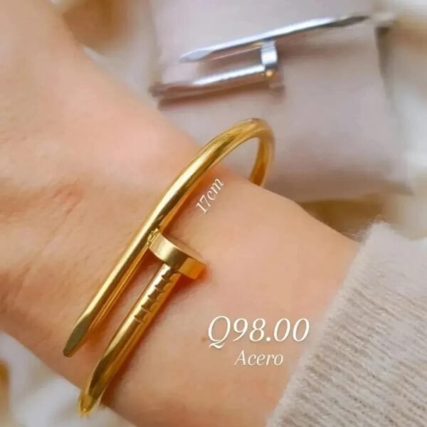 Pulsera tipo Clavo acero Dorado
